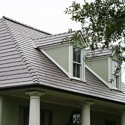 Metal shingle roofing